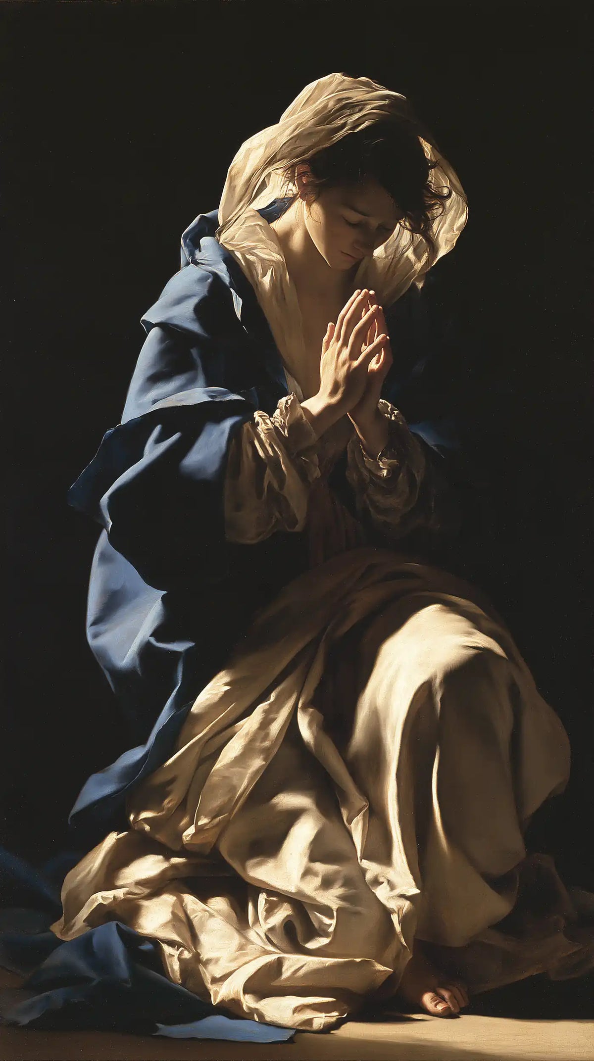 La Vierge en prière — L’Ivoire et le bleu de la ferveur